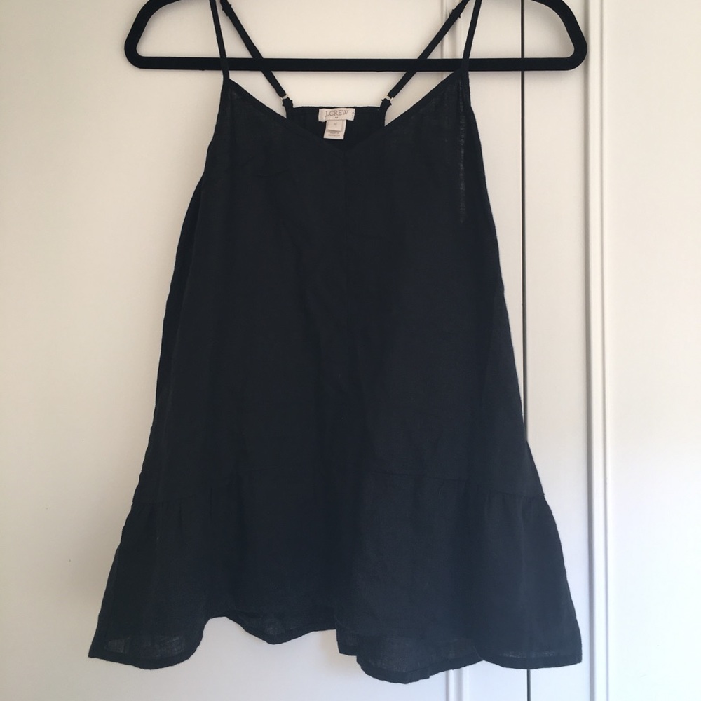 Black peplum top, says size 12 but fits size 6